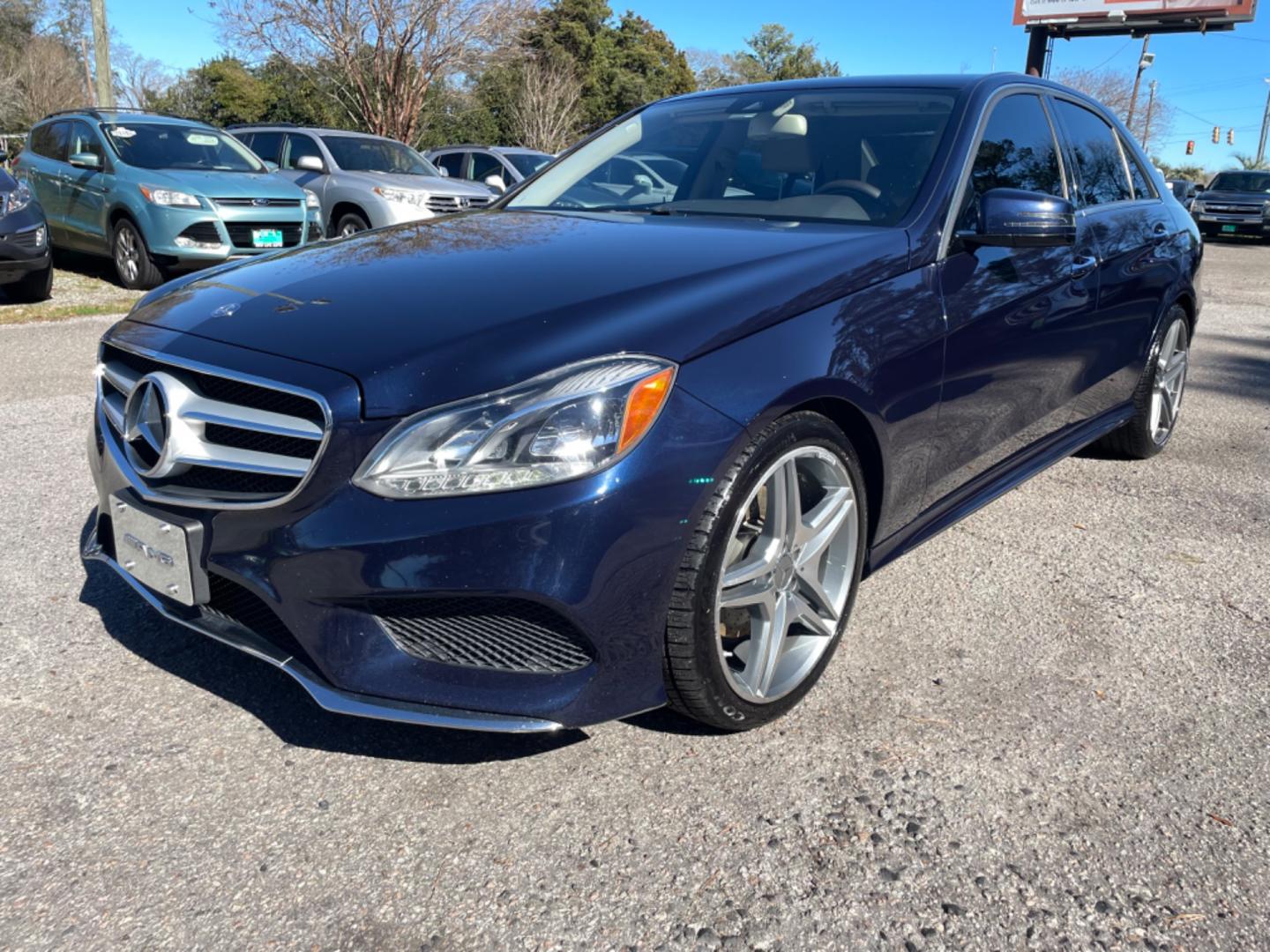 2014 BLUE MERCEDES-BENZ E-CLASS E 350 LUXURY 4MATIC (WDDHF8JB1EB) with an 3.5L engine, Automatic transmission, located at 5103 Dorchester Rd., Charleston, SC, 29418-5607, (843) 767-1122, 36.245171, -115.228050 - Beautiful & Clean Interior with Leather, Sunroof, Navigation, Backup Camera, Push button start, CD/AUX/Sat/Bluetooth, Dual Climate Control, Power Everything (windows, locks, seats, mirrors), Power Rear Sunshade, Heated/Memory Seating, Keyless Entry, Alloy Wheels. Clean CarFax (no accidents reported! - Photo#2